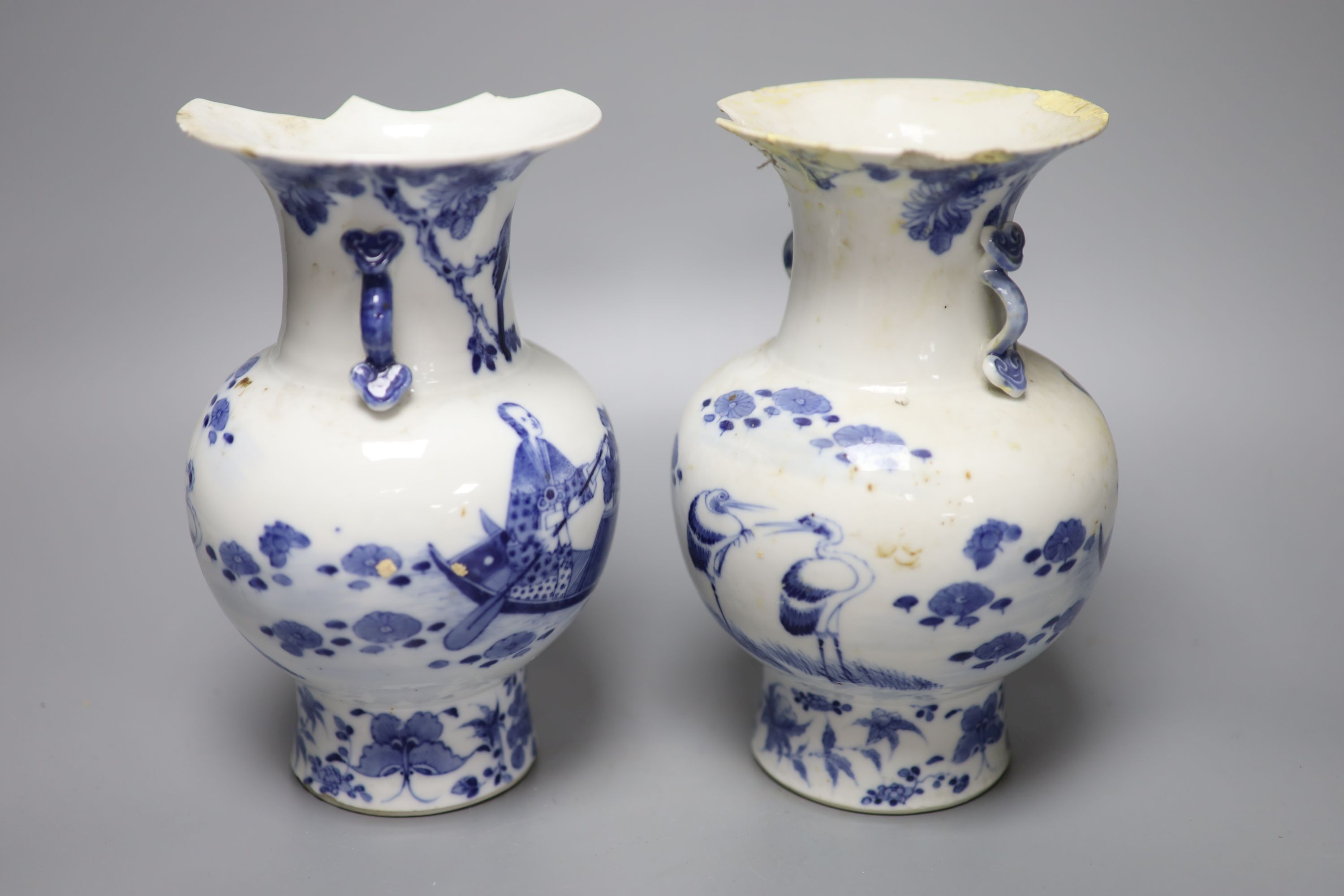 A pair of 19th century Chinese blue and white vases (a.f.), 23cm high